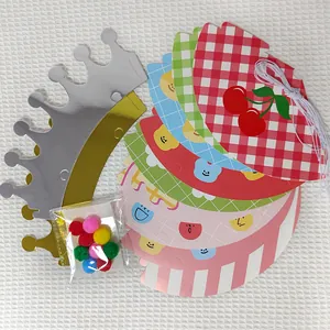 DIY children party hat set featuring paper crowns, colorful pom-poms and grid pattern sheets