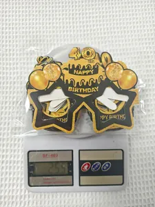 Detail of 40th Birthday star glasses with gold glitter finish in clear packaging