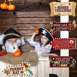 Pirate theme party yard signs for outdoor birthday event featuring kids in pirate costumes
