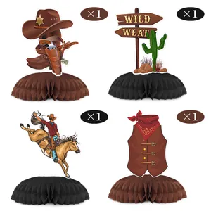 Detail of Western cowboy honeycomb table centerpieces featuring sheriff hat and wild west designs