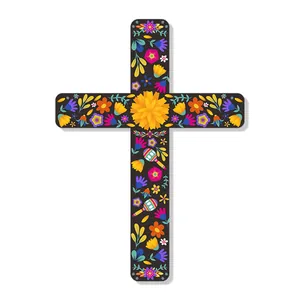 Detail of Day of the Dead black cross wall decor with colorful marigolds and maracas