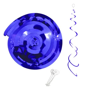 Close-up of royal blue foil swirl party decorations with hooks for birthday settings