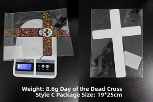 Detailed view of colorful Day of the Dead flower skull cross with adhesive tape