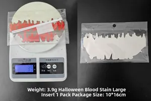 Detail of Happy Halloween bloody cake topper set showing weight and packaging
