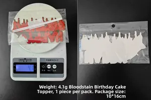 Detailed view of blood-splatter happy birthday cake topper showing size and 4.1g weight