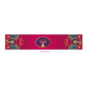 Deep burgundy and gold Diwali table runner featuring peacock motifs and Diya patterns
