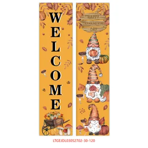 Close-up of Thanksgiving porch banners featuring festive gnomes and autumn pumpkins
