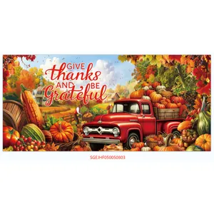 Detail of harvest backdrop featuring red vintage truck and pumpkins with Give Thanks text