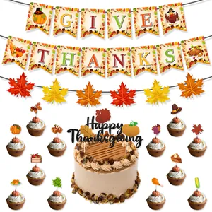 Detail of Thanksgiving party banners and cake toppers with autumn leaves and turkey motifs