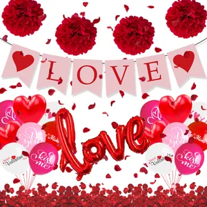 Detailed Valentine's Day party set with LOVE banners, heart balloons and rose petals