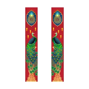 Detail of vibrant Diwali door hangings with colorful Diya and peacock patterns on red background