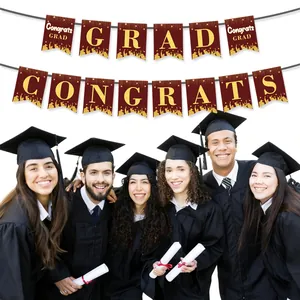 Maroon and gold glitter graduation banners featuring Grad and Congrats lettering for party decor