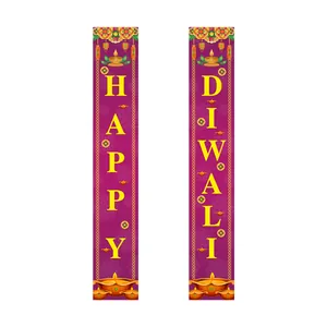 Close-up of Diwali door banners with Happy Diwali text and traditional Diya lamp patterns