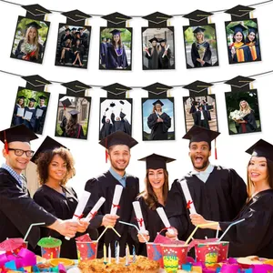2026 graduation party photo banner with 12 black mortarboard frames and gold tassels