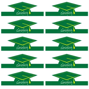 Set of 10 green graduation mortarboard paper props with Congrats text for school celebrations