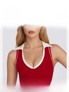 Detail view of contrast white collar and deep V-neckline on a red yoga sports tank top
