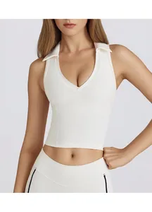 Detail of the white deep V-neck yoga vest showing the lapel collar and slim-fit ribbed fabric