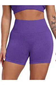 Detail of purple high-waisted seamless yoga shorts showing ribbed texture and compression