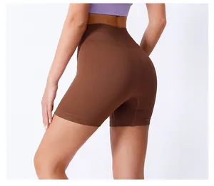 Detail of high waist seamless ribbed yoga shorts showing fabric texture and stretch fit