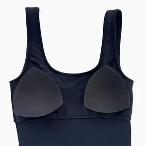 Detail of seamless ribbed sports bodysuit with removable pads and supportive wide straps