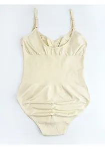 Detail view of seamless low-back bodysuit with adjustable straps and butt lifting feature