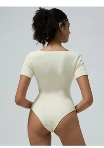 Macro shot of off-white ribbed knit fabric on a seamless bodysuit with back view details