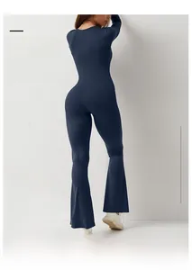 Tuta da yoga blu scuro a costine a maniche lunghe con gamba a zampa e design modellante
