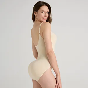 Seamless backless bodysuit in beige with compression ribs for tummy control and butt lifting