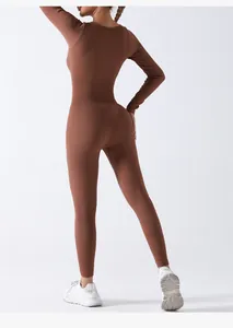 Detail view of the seamless ribbed knit texture on the back of a brown yoga bodysuit