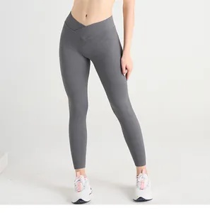 Close-up of the V-shaped cross waistband on high-waisted seamless dark grey yoga pants