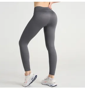 Close-up of seamless ribbed high waist yoga pants in dark grey with butt lifting texture