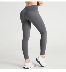 Detailed view of dark grey high-waisted seamless yoga pants with ribbed texture knit