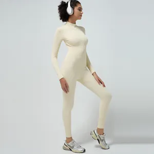 Women's ribbed long sleeve zip-up athletic jumpsuit in cream white for yoga and fitness