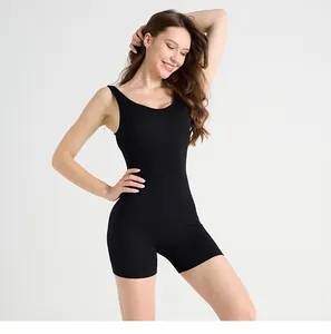Close-up of black ribbed yoga bodysuit featuring U-neckline and tight sculpting fit