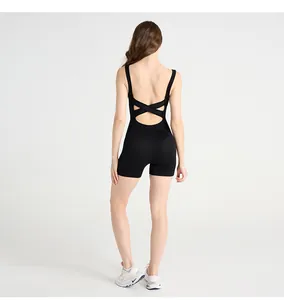 Detail view of black cross-back bodysuit showing open back design and ribbed fabric