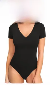 Close-up of slim fit black seamless V-neck bodysuit showing high elastic fabric texture