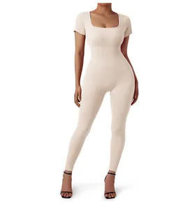 Close-up of beige ribbed knit jumpsuit showing high-elasticity fabric and square neck detail