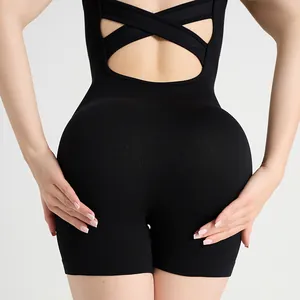 Black ribbed athletic bodysuit with padded open-back cross design for fitness yoga