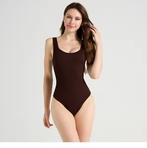 Macro view of seamless ribbed knit texture on coffee brown athletic yoga bodysuit