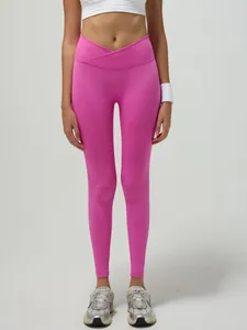 Pantaloni da yoga rosa da donna con vita a V incrociata e design senza cuciture