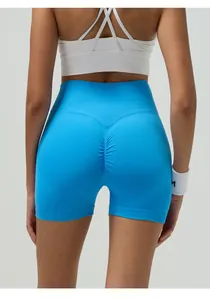 Macro view of blue seamless yoga shorts showing the scrunch butt lifting detail