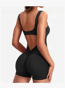 Detail of black seamless yoga bodysuit featuring cutout back and ruched butt lifting design