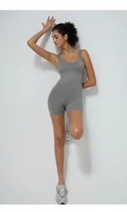 Close-up of deep gray ribbed yoga bodysuit with seamless texture and narrow straps