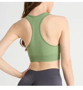 Détail du soutien-gorge de sport dos nageur vert avec ourlet côtelé pour maintien optimal