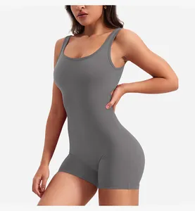Close-up of charcoal yoga jumpsuit featuring a racerback cutout and high-stretch fabric