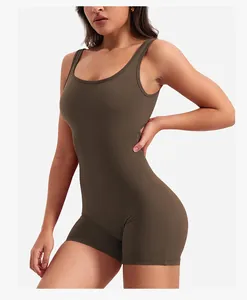 Detail of high-stretch seamless yoga bodysuit with slimming waist and brown matte texture