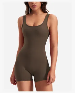 Close-up of brown yoga bodysuit featuring a deep U-neck and matte elastic fabric