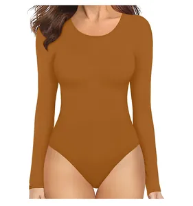 Close-up of caramel brown long sleeve bodysuit with crew neck and slim fit texture