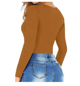 Back view of a slim fit brown long sleeve bodysuit paired with blue jeans for casual wear