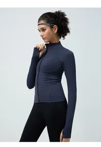 Detail view of seamless fitness jacket with breathable texture and thumb hole design